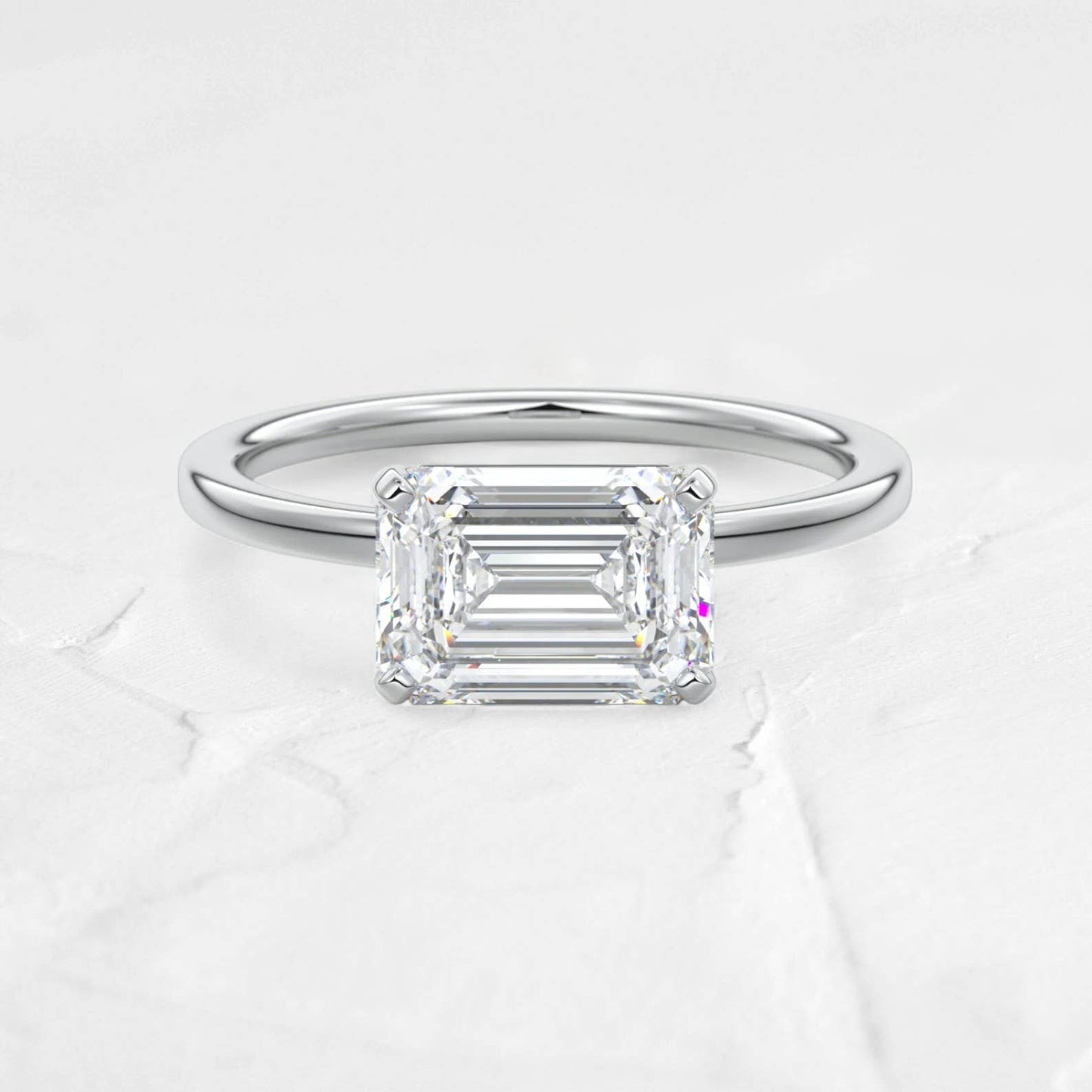 1.5CT East-West Emerald Moissanite Solitaire Ring in .925 Silver